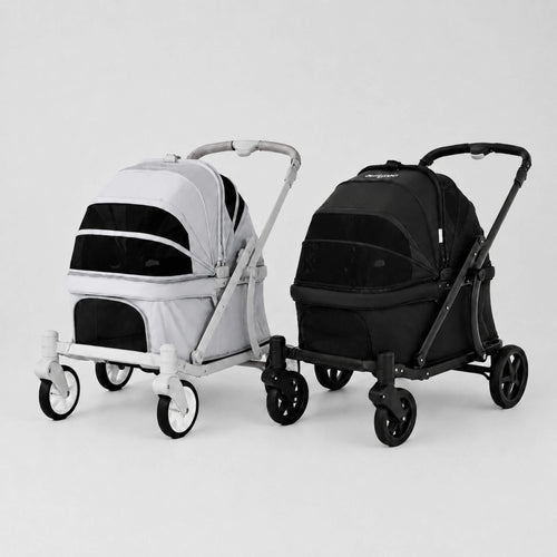 Two pet strollers shown side by side on a clean light gray studio background. The stroller on the left is light gray with black panels, and the stroller on the right is black with dark gray panels.